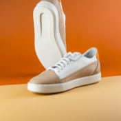 Brown and off-white sneakers — front view
